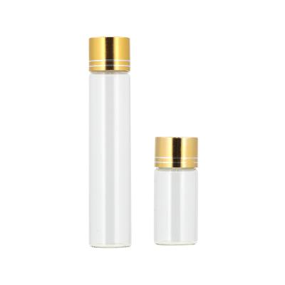 China Clear Mini Glass Bottle Empty Medicine Packaging Glass Tube With Gold/Silver Cap for sale