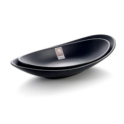 China Sustainable Hot Sale Restaurant Salad Boat Shape Small Matte Black Dish for sale