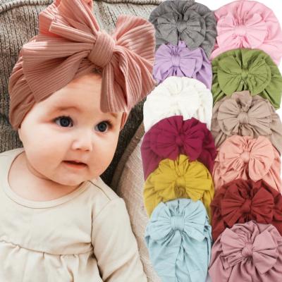 China Applicable to four seasons wholesale new stretch cotton bow scarf hat for children newborn baby hats baby hat for sale