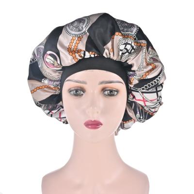 China Eco-friendly fashionable and popular large printed satin bonnets for women hair bonnet nightcap product for sale