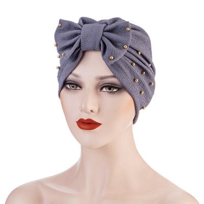 China Plush Bow Turban Women's Headscarf Hat Turban Head Hood For Women for sale