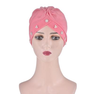 China New 2021 fashion turban fashion pearl cashmere african turban wholesale head scarf hat for african women for sale