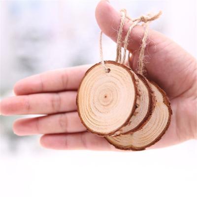 China Wooden Craft New Christmas Tree Hanging DIY Christmas Decoration Ornaments Small Wooden Slices for sale