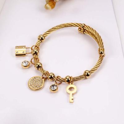 China High Quality Fashion Jewelry Stainless Steel Lock Key Gold Plated Disc Charm Bracelet for sale