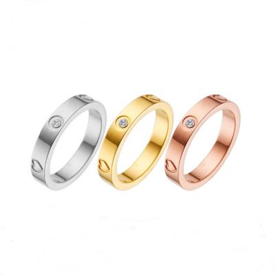 China High Quality Hot Selling Gold Plated Stainless Steel Zircon Ring With Heart Band Ring For Women Men for sale