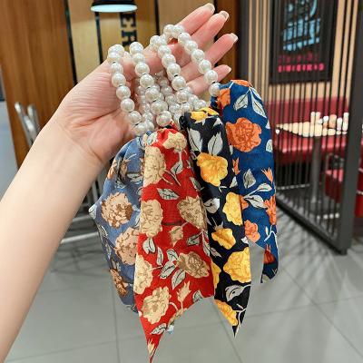 China New Design Chiffon Floral High Stretch Pearl Satin Bow Hair Scrunchies Ponytail Holder For Women for sale