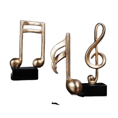 China Creative Europe Musical Notes Decoration Music Art Living Room Decorations Resin Sculpture Ornaments Office Home Furnishing for sale