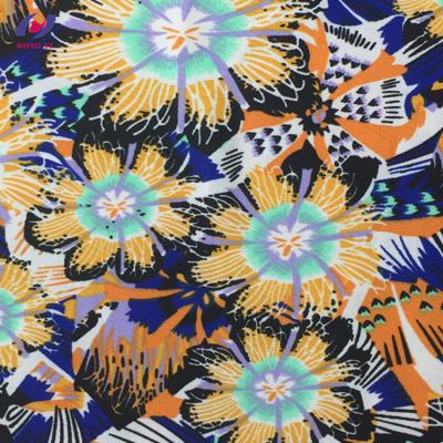 China Floral Printed Stretch Warp Knitted Thin Stretch Swimwear Fabric for sale