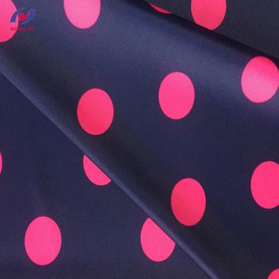 China Stretch Knitting 4 Way Stretch Polka Dot Printed Nylon/Polyester Spandex Swimwear Fabric Made in China for sale