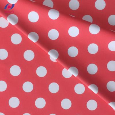 China Stretch Knitting 4 Way Stretch Polka Dot Printed Nylon /Polyester Spandex Swimwear Fabric Made in China for sale