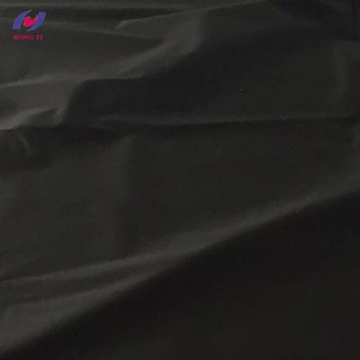 China 100% Navy Anti-Static Anti-Static Black Polyester Wind Coat Fabric For Garment for sale