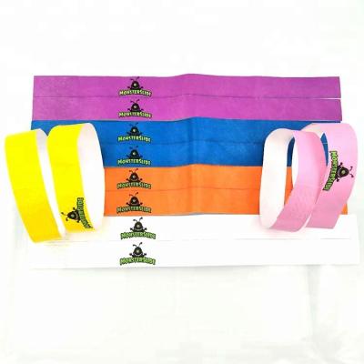 China OEM free samples logo wristband cheap tyvek waterproof custom colored Christmas paper wristbands for events for sale