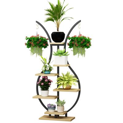 China wholesale modern metal modern indoor decoration wedding living room display jingqi flower pot rack wood black for sale