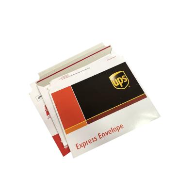 China Recyclable High Quality Wholesale Customized Logos Cardboard Mailers Cardboard Envelope With Tear Strip for sale