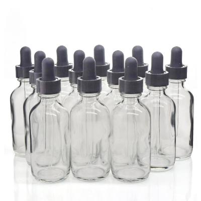 China E liquid/e juice/e/essential oil fast delivery 2oz clear round glass dropper bottle for eliquid essential oil 60ml boston screw bottle for sale