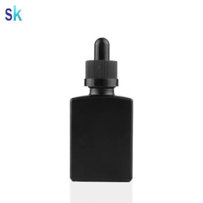 China E liquid/e juice/e cig oil/essential oil 30ml frosted black CBD oil rectangle dropper packaging glass bottle for sale