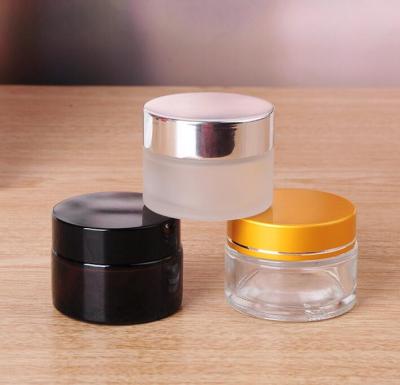 China Personal care hot sale glass jar with siver cap packing for cream glass bottle for sale