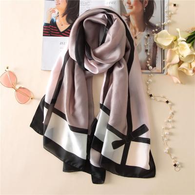 China Fashion silk feeling 100% own design silk scarf 2019 custom brand design Digital printing famous brand new stretching silk scarf for sale