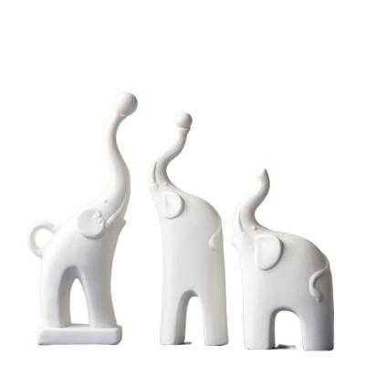 China Art Decor Wholesale Handmade Ceramic Porcelain Crafts Elephant Living Room Furnishings Figurines Animal Statue for sale