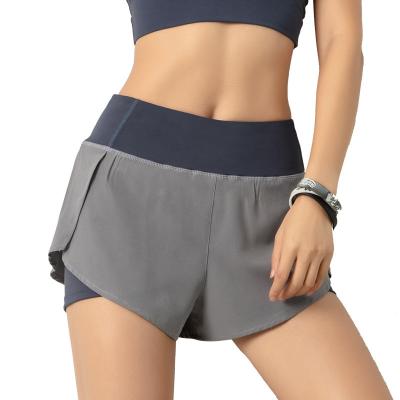 China Breathable new European and American fitness sports shorts women's summer anti-glare shorts for sale