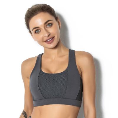 China Solid Color Breathable Hot Selling Sports Invest Strapless Yoga Cross Shockproof Gathered Bare Bra for sale