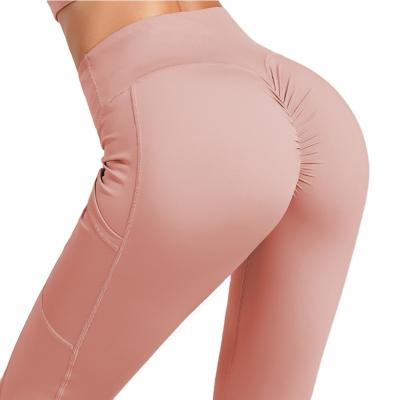 China Long Yoga Pants Women Gaiters Warm Breathable Nylon Fitness High Waist Yoga Pants With Pockets Hip Lift Up Tights Leggings for sale