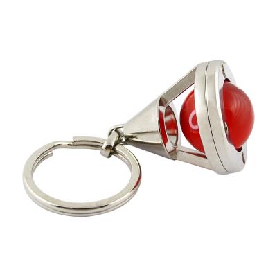 China Eco Friendly Fashion Design 3D Custom Key Chain With Rotating Resin Ball for sale