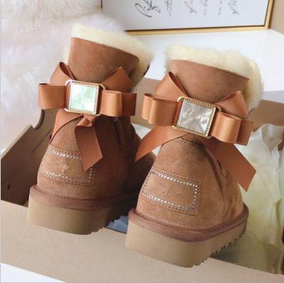 China 2020 Real Sheepskin Waterproof Bowknot Breathable Winter Ladies Boots Australian Shoes For Women for sale