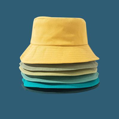 China Decoration Summer Beach Bucket Hats Unisex 100% Cotton Sports Empty Bucket Hats for sale