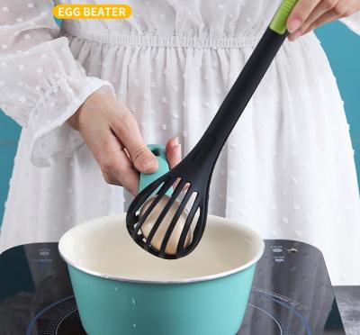 China Multifunctional Nylon Hand Mixer Spoon Viable Multifunctional Nylon Hand Mixer Spaghetti Pasta Beater Egg Tongs Food Beater Egg Salad Tool Creative Kitchen Instruments for sale