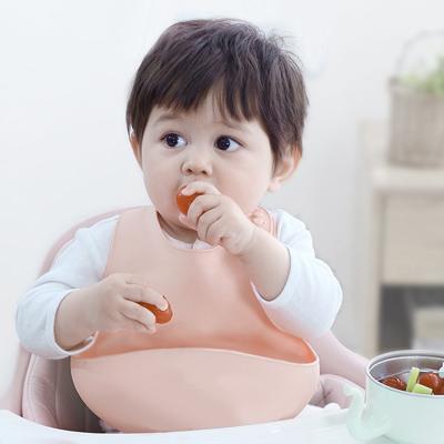 China Baby Traditional Silicone Bibs Feeding Dish Waterproof Solid Color Bib Lunch Aprons Fabrics Toddler Saliva for Boys Girls for sale