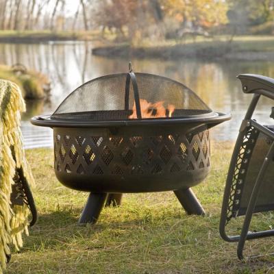 China Stored Outdoor Round Steel Wood Burning Fire Pit With Cover for sale