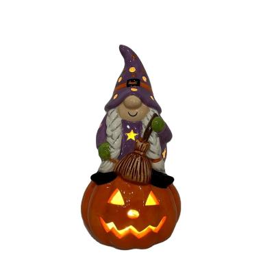 China LED Witch Lit Ceramic Pumpkin For Halloween Decoration for sale