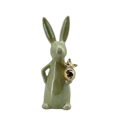 China Ceramic ceramic rabbit with carrot for Easter decoration 2023 for sale