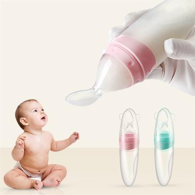 China Wholesale BPA Free Custom Baby Squeeze Spoon Cereal Bottle Spoon Feeder Silicone Feeding Bottle with Spoon for sale