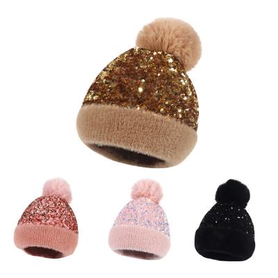 China 2021 NEW Sequin Woolen Woolen Hat Women's Warm Detachable Plush Ball Knitted Hat for sale