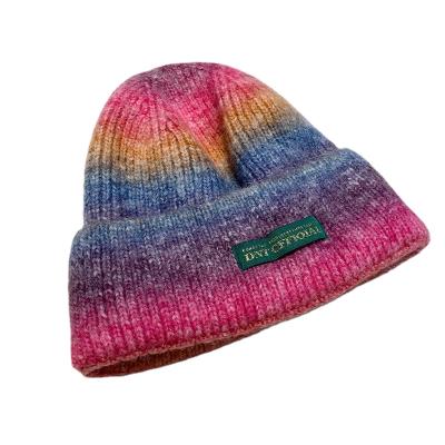 China Autumn and winter COMMON bond dyed knitted hat women's minority design gradient woolen warm hat for sale