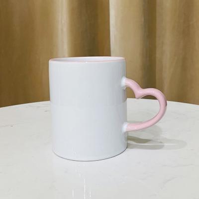 China Free Sample 11oz Viable Ceramic Sublimation Mug Supplier, DIY Photo Copy LOGO Sublimation Blank Coffee Mugs With Heart Shape Handle for sale