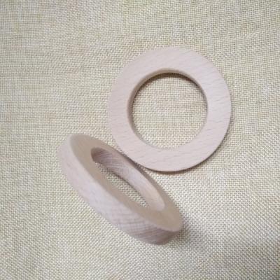 China Soft Toy 80mm Ring Flat Wooden Toy Natural Custom Wooden Teething Ring For Baby Crafts for sale