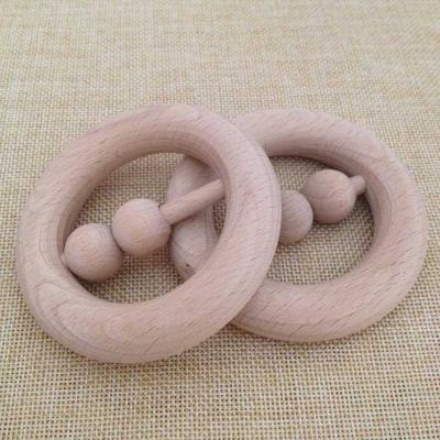 China Soft Toy Natural Round Wooden Baby Teether Rattle with Beads Wooden Shaker Rattles for sale