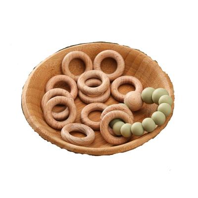 China Wooden Ring Natural Beech Wood Wooden Circle 25mm Mini Teethers DIY Teethers Bracelet Ornaments Accessories for sale