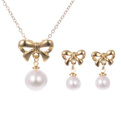 China FASHIONABLE Elegant Gold Plated Sledge Alloy Necklace Women Bow Pearl Necklace Earrings Pendant Jewelry Set For Valentine's Day Gift for sale