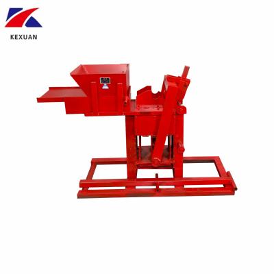 China Hot selling hotels one hand pressed clay brick machine in Africa lego block interlocking molding machine for sale