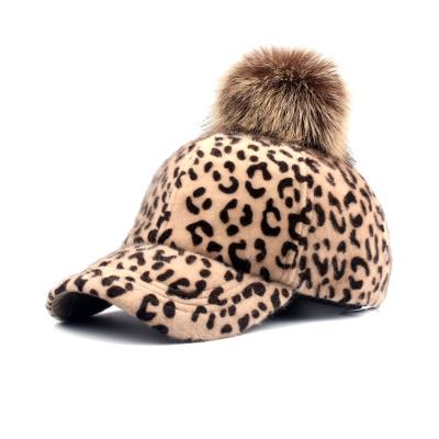 China JOINT hat ladies fall winter baseball cap Europe America leopard print jacquard fur pom detachable hat for sale