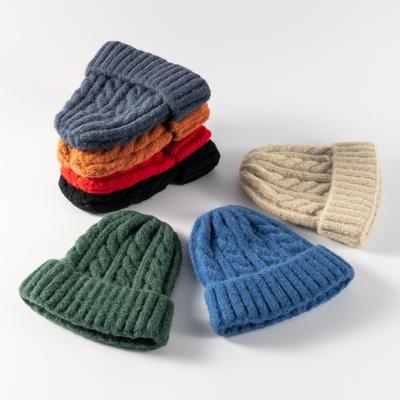 China JOINT Winter Twist Knit Hat Logo Solid Color Custom Winter Beanies for sale