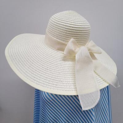 China Foldable Cheap Beach Straw Hat Women Wide Brim Bowknot Straw Hat Summer Hats Women Beach Hats for sale