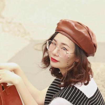 China Custom Picture Leather Beret With Big Bow Drop Winter Womens Leather Beret for sale