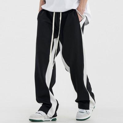 China Anti-wrinkle Custom Brand Wide Leg Sweatpants OEM Streetwear Jogger Drawstring Patchwork Baggy Men's Pants for sale