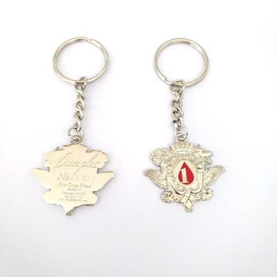 China Die cut zinc alloy custom embossed shape logo car 3d silver metal keychains for sale