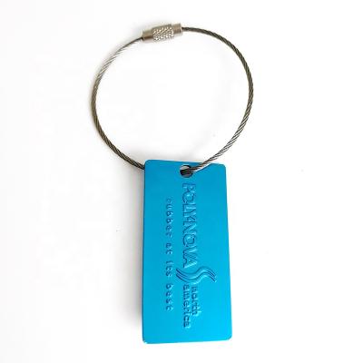 China Eco-friendly Attractive Anodized Blue Aluminum Metal Custom Embossed Logo Metal Labels Luggage Tags for sale